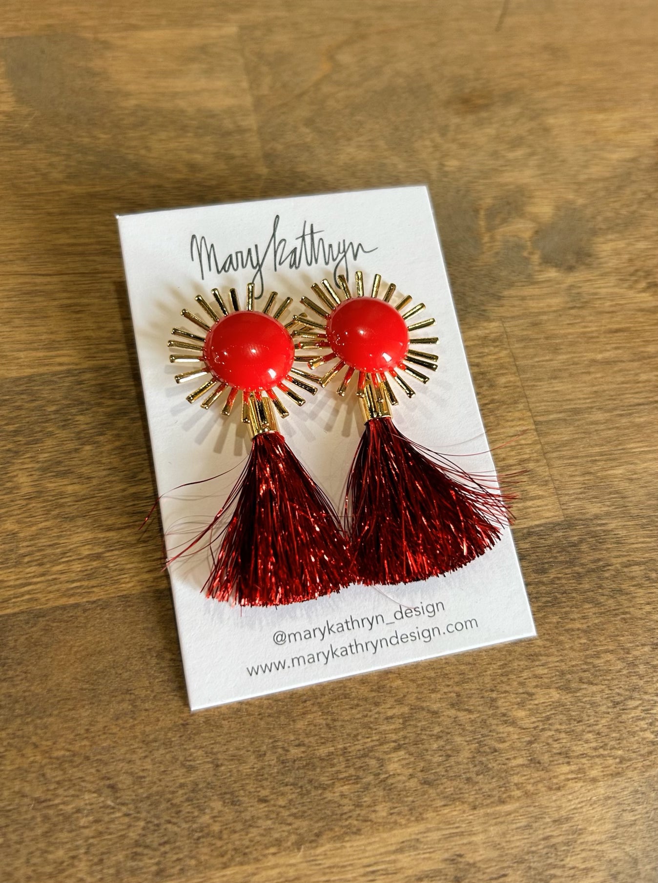 red metallic tassel earrings