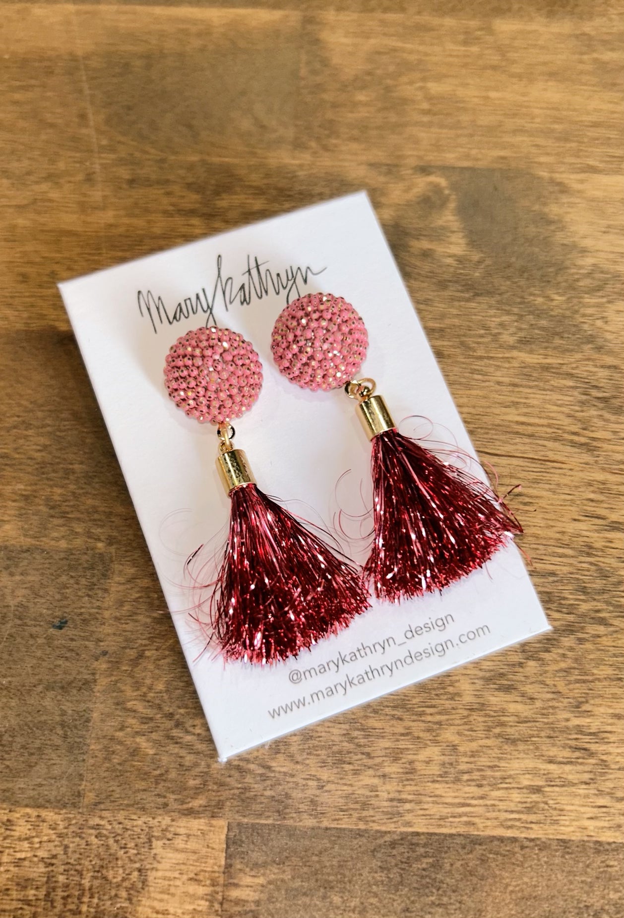 pink metallic tassel earrings